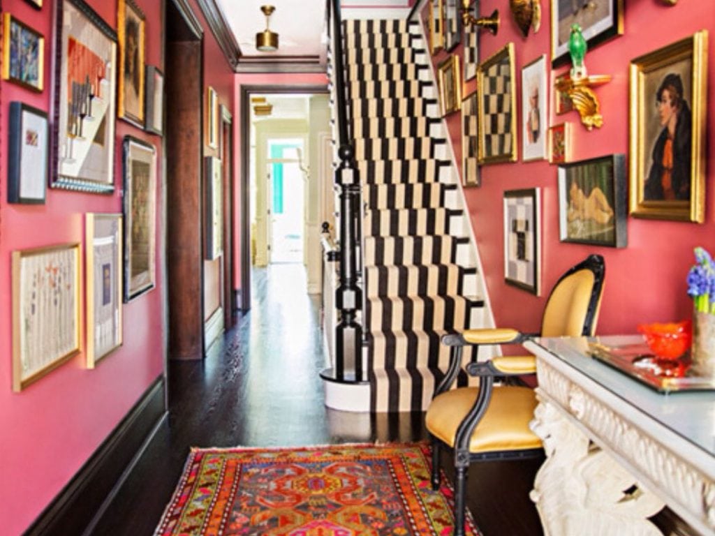 Chair beside staircase on hallway