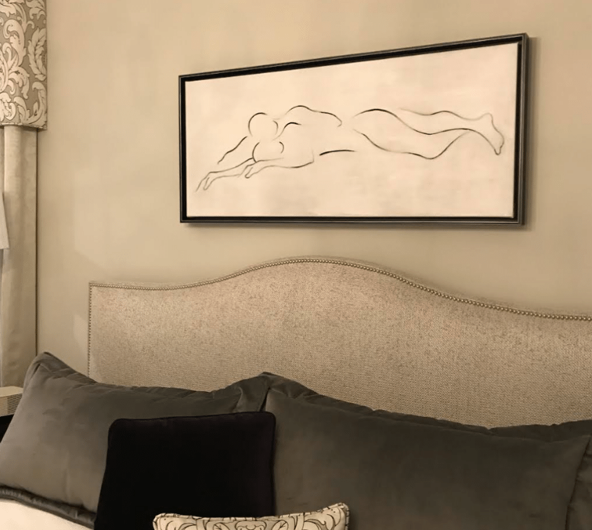 Four gray and black bed pillow inside bed room