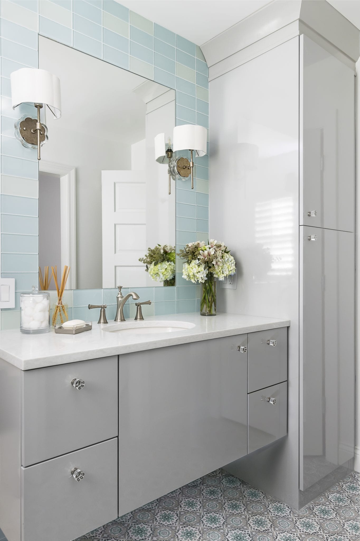 gray cabinetry in bathroom