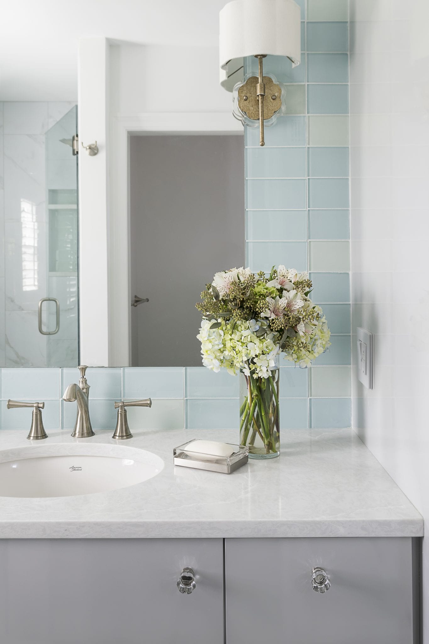 closeup blue tile bathroom